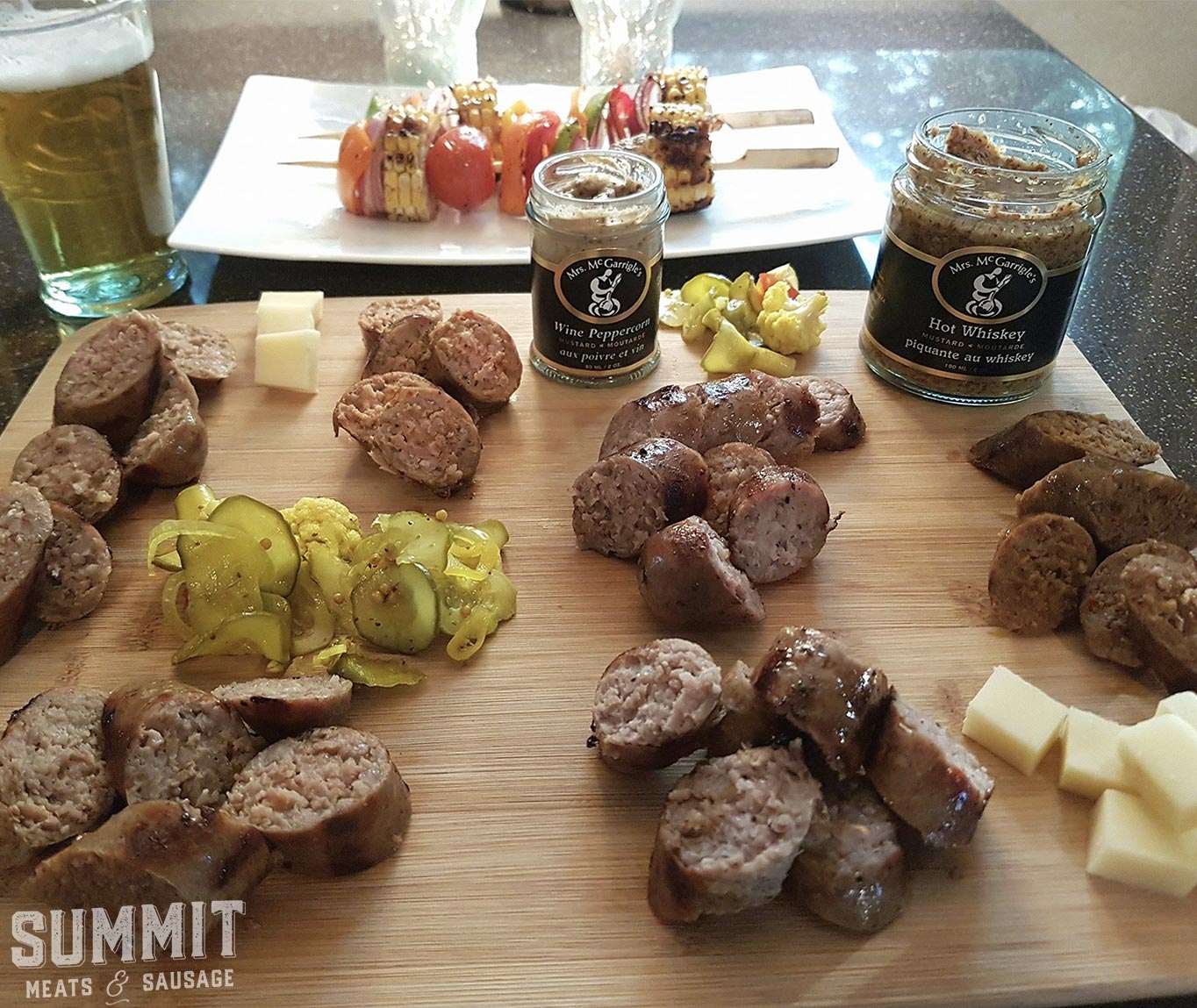 Photo of a charcuterie board with a variety of sausages from Summit Meats in Saskatoon